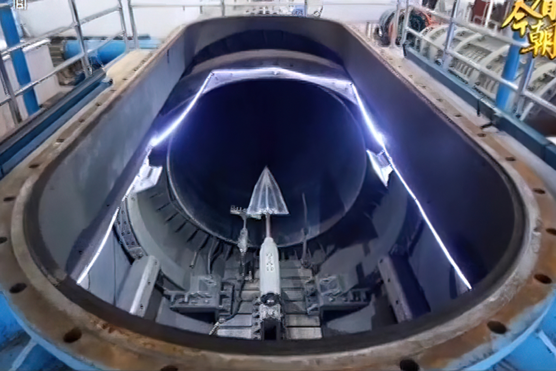 A glide vehicle model undergoes testing in a hypersonic wind tunnel in a special feature on Chinese state television.