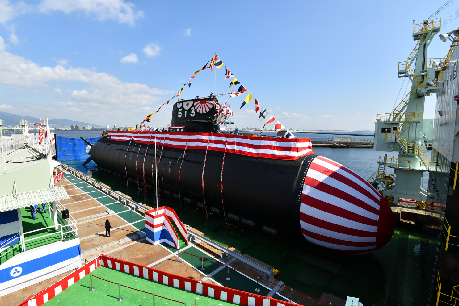 The lead boat of a new class of SSKs for the JMSDF, JS Taigei, seen here at her launch in October 2017 represents the future of Japan’s submarine capability. Tokyo maintains a steady drumbeat of SSK production with orders sustaining both MHI and KHI shipyards and is able to undertake a gradual process of modernisation through successive classes. (Japan MoD)